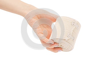 Roll elastic bandage in hand
