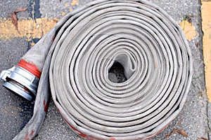 A roll of fire-resistant fire hose