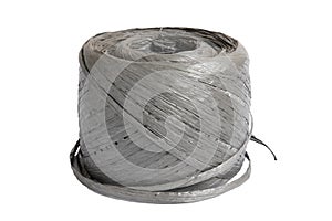 Roll of grey raffia string or plastic rope photo