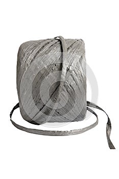 Roll of grey raffia string or plastic rope photo