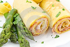 Roll with ham, cheese and asparagus photo