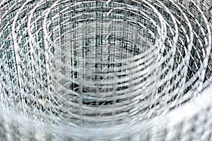 A roll of hardware  metal mesh cloth. Abstract blurred vision