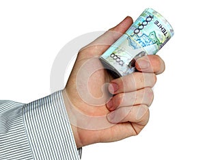Roll of kazakh money in hand