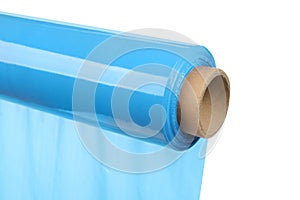 Roll of light blue stretch wrap isolated on white, closeup