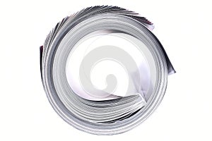 Roll magazine on white background