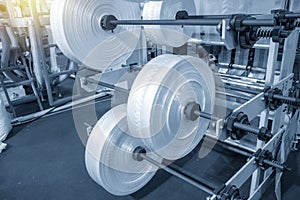 The roll of material for plastic bag production.