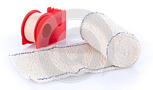 Roll of medical bandage with sticking plaster