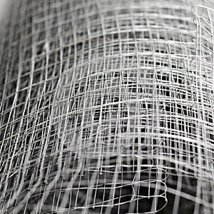 Roll of metal net. Construction tool