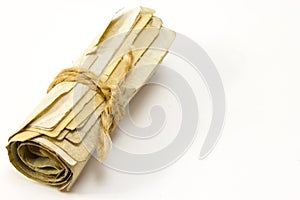 Roll of money tied with a rope