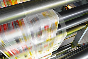 roll offset print machine in a large print shop for production of newspapers & magazines