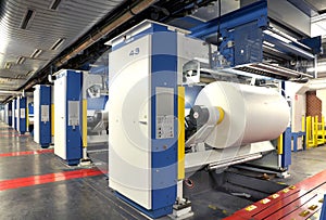 Roll of paper on an offset press for finishing / printing daily