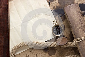 Roll of parchment with a compass
