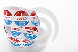 Roll of red white and blue I voted stickers with American flag