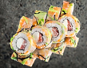 Roll with salmon, avocado, grapefruit
