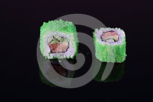 Roll with salmon in green masago.