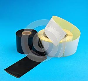 Roll of self-adhesive stickers and Tape for thermal transfer printing. Ribbon thermal transfer tape TTR