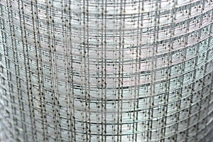 Roll of steel metal mesh. Abstract background