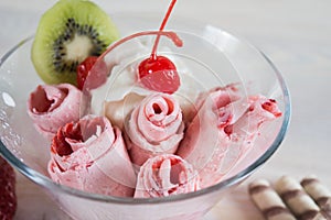 Roll of Strawberry ice cream. Fresh fried berry ice cream, ice