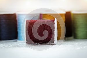The roll of thread on background,needlework,craft,sewing and tailoring