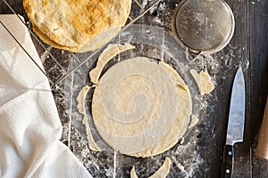 Roll up dough for Napoleon cake. Cooking process