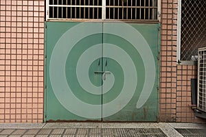 Roll up garage door on brick wall