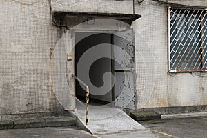 Roll up garage door on brick wall