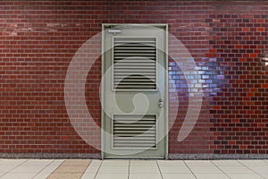 Roll up garage door on brick wall