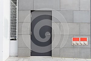 Roll up garage door on brick wall