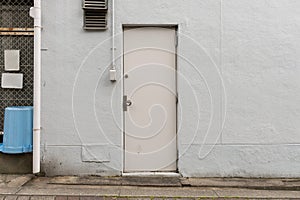 Roll up garage door on brick wall