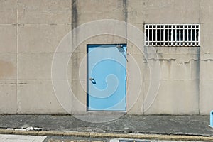 Roll up garage door on brick wall