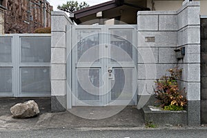 Roll up garage door on brick wall