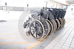 Roll of wheel chair with the hard sunlight. Healthcare concept