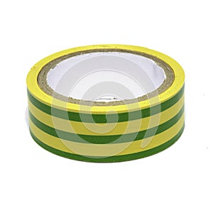 Roll of yellow-green striped plastic duct tape isolated on white