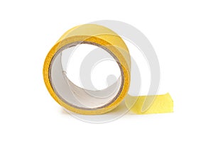 Roll of yellow masking tape on white background