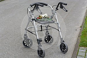 Rollator walker with grave candle