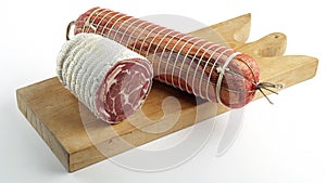 Rolled Bacon on cutting board
