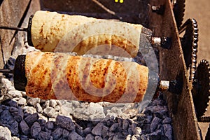 Rolled bakery meat rolls in charcoal