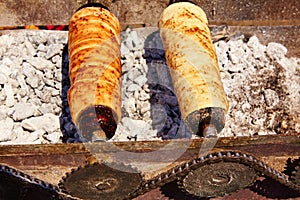Rolled bakery meat rolls in charcoal