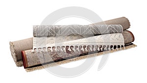 Rolled carpets on white background. Interior element