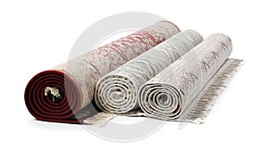 Rolled carpets on white background. Interior element