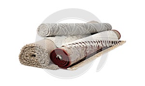 Rolled carpets on white background. Interior element
