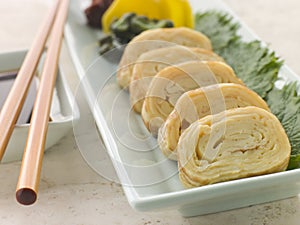 Rolled Dashi Omelette with Pickled Vegetables Soy