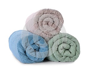 Rolled fresh clean towels on white background