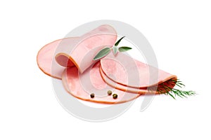 Rolled ham slices isolated on white background with herbs and spices