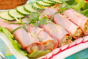 Rolled ham stuffed with salad