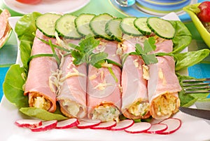 Rolled ham stuffed with salad