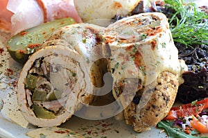 Rolled meat with ham,mushrooms and pickles