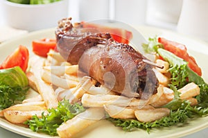 Rolled meat skewer with french fries