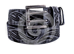 Rolled men`s leather belt with metal buckle isolated on white photo