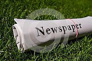 Rolled newspaper